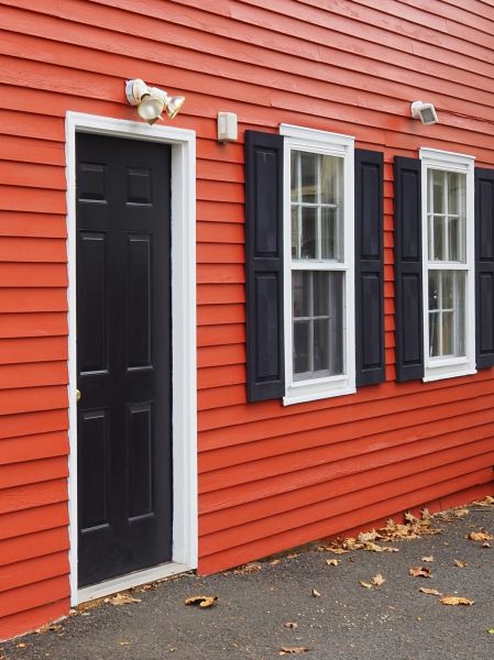 Red Vinyl Siding Installation in Baytown