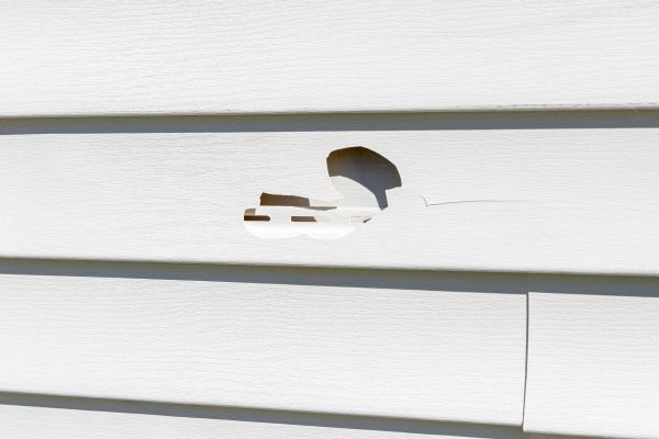 White Vinyl Siding Repair in Baytown